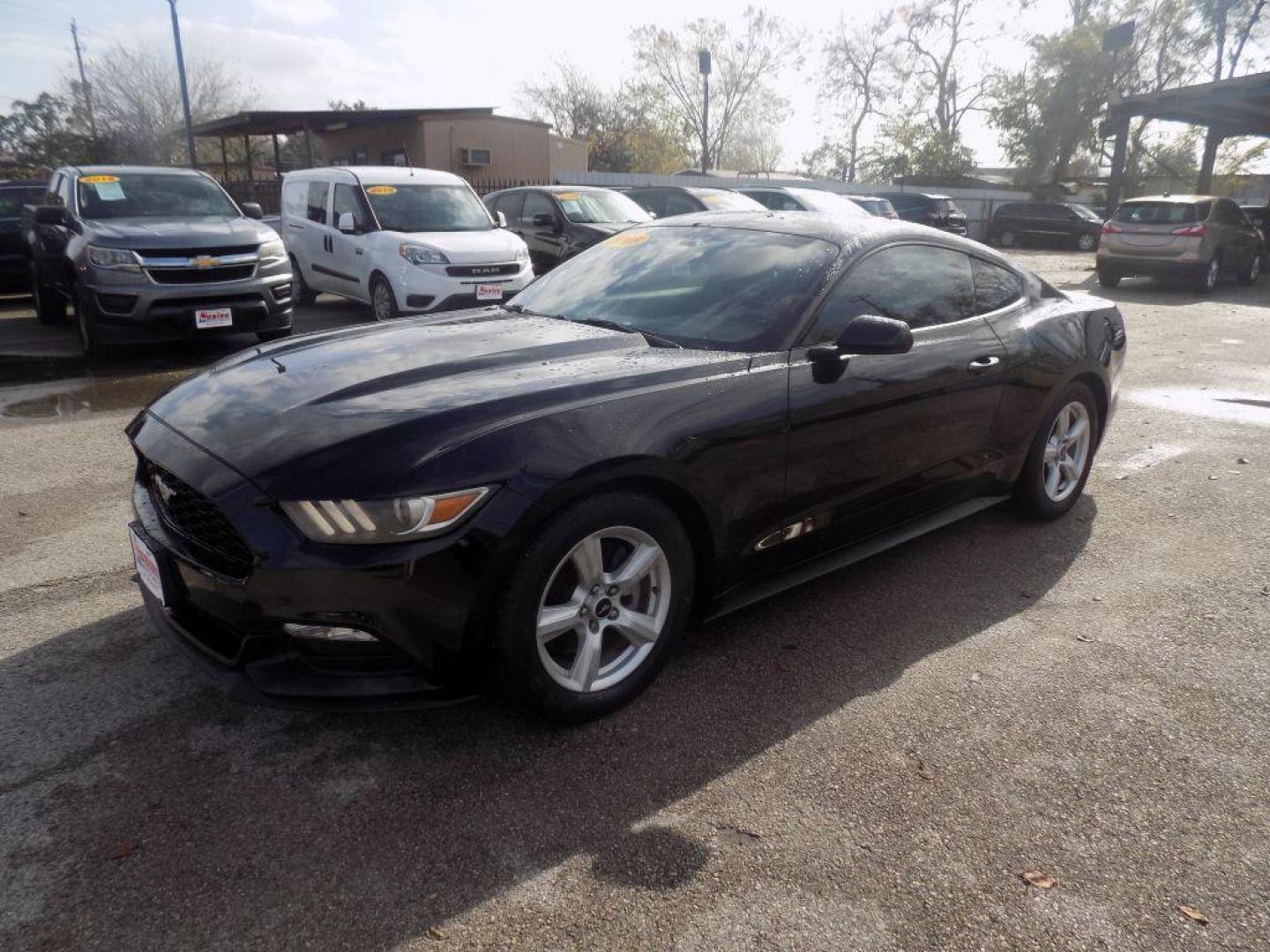 2016 BLACK FORD MUSTANG (1FA6P8AM2G5) with an 3.7L engine, Automatic transmission, located at 830 E. Canino Rd., Houston, TX, 77037, (281) 405-0440, 38.358219, -81.729942 - Photo#5