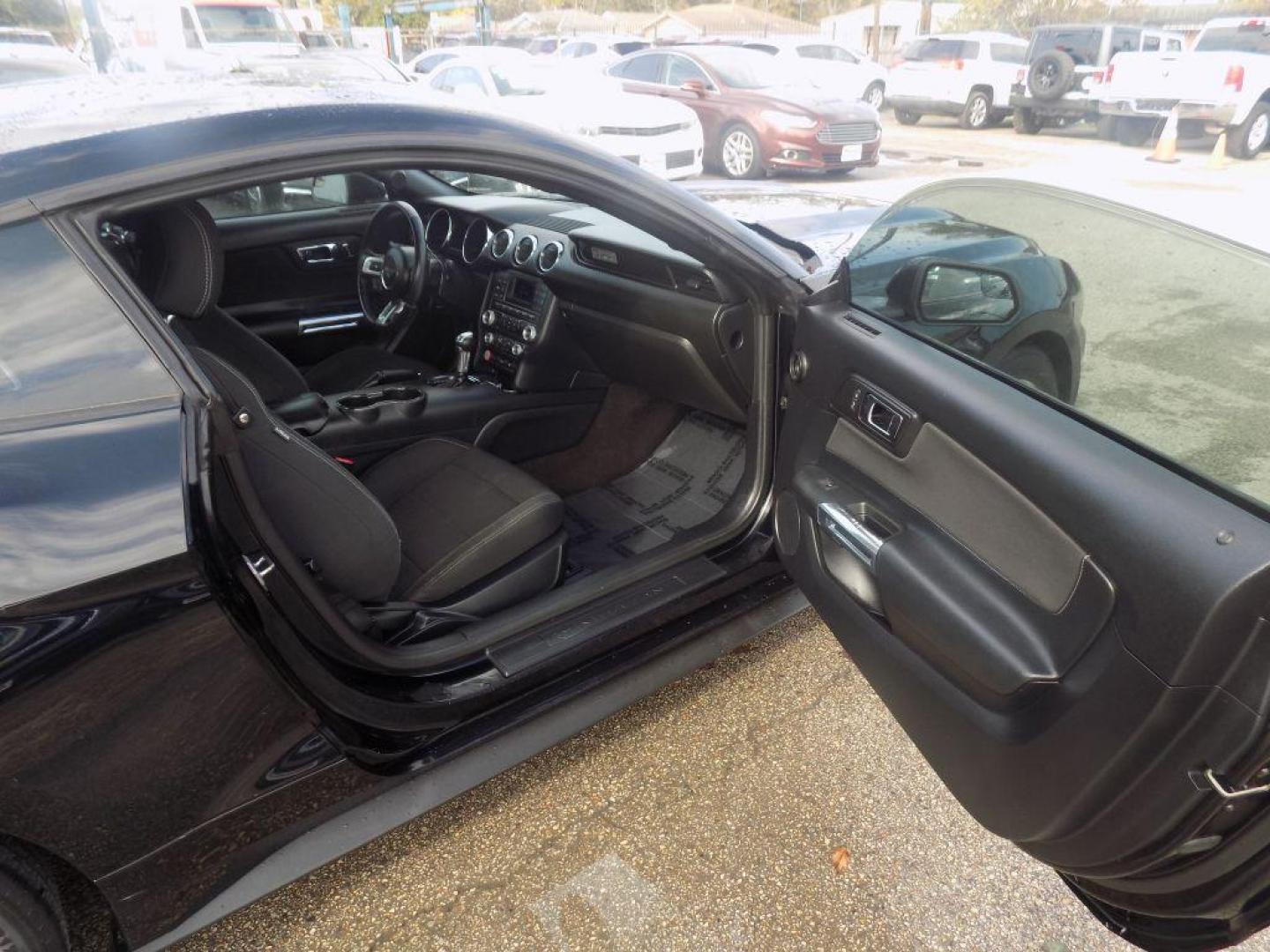 2016 BLACK FORD MUSTANG (1FA6P8AM2G5) with an 3.7L engine, Automatic transmission, located at 830 E. Canino Rd., Houston, TX, 77037, (281) 405-0440, 38.358219, -81.729942 - Photo#8