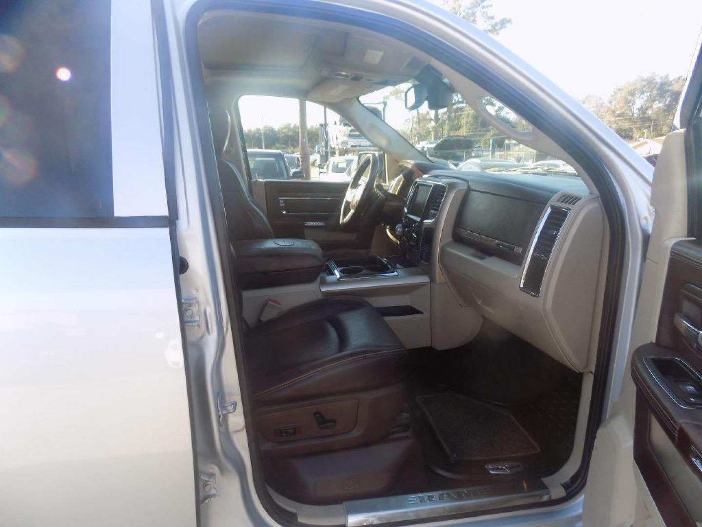 2015 SILVER RAM 1500 LONGHORN (1C6RR6WT8FS) with an 5.7L engine, Automatic transmission, located at 830 E. Canino Rd., Houston, TX, 77037, (281) 405-0440, 38.358219, -81.729942 - Photo#9