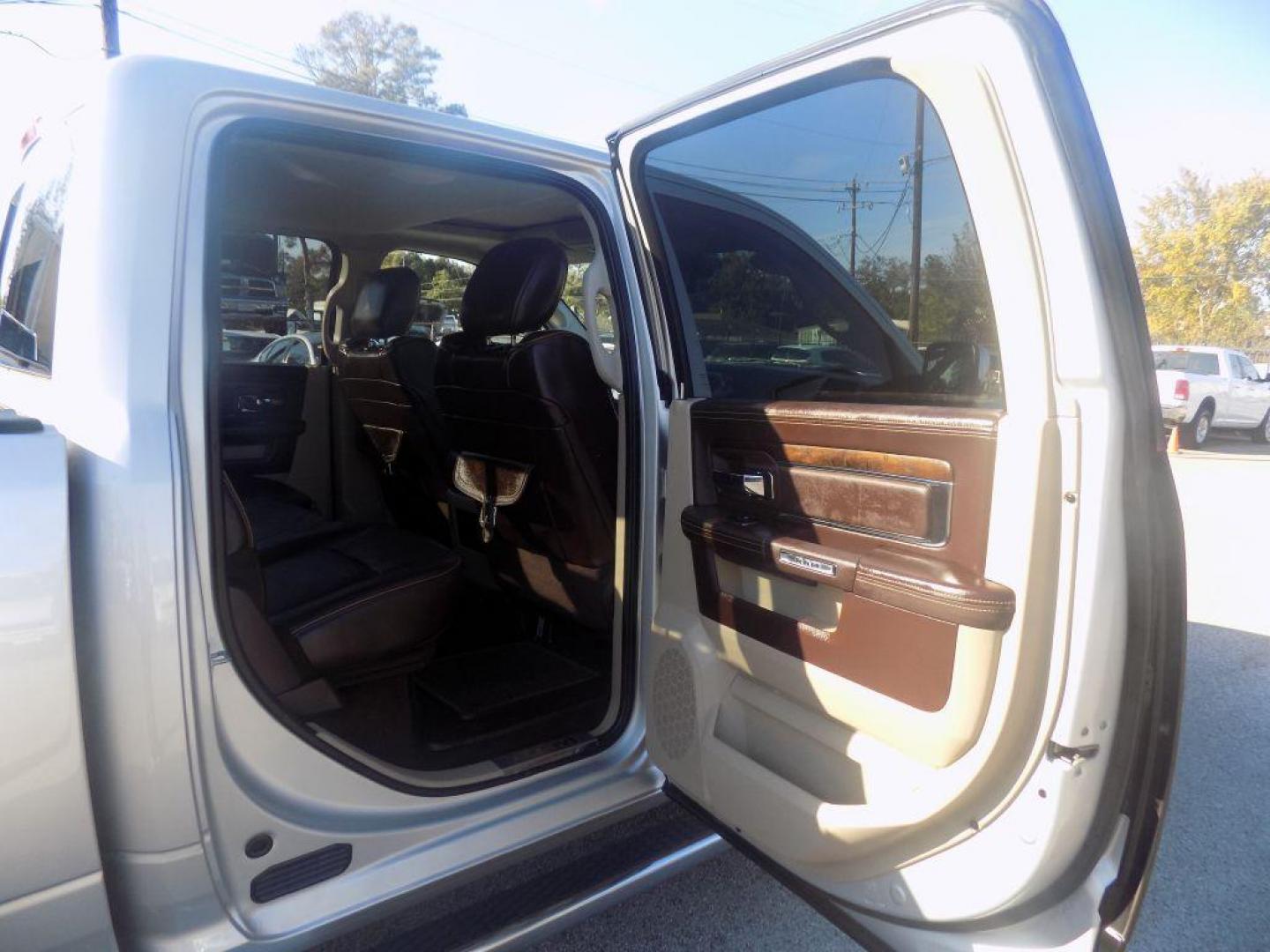 2015 SILVER RAM 1500 LONGHORN (1C6RR6WT8FS) with an 5.7L engine, Automatic transmission, located at 830 E. Canino Rd., Houston, TX, 77037, (281) 405-0440, 38.358219, -81.729942 - Photo#10