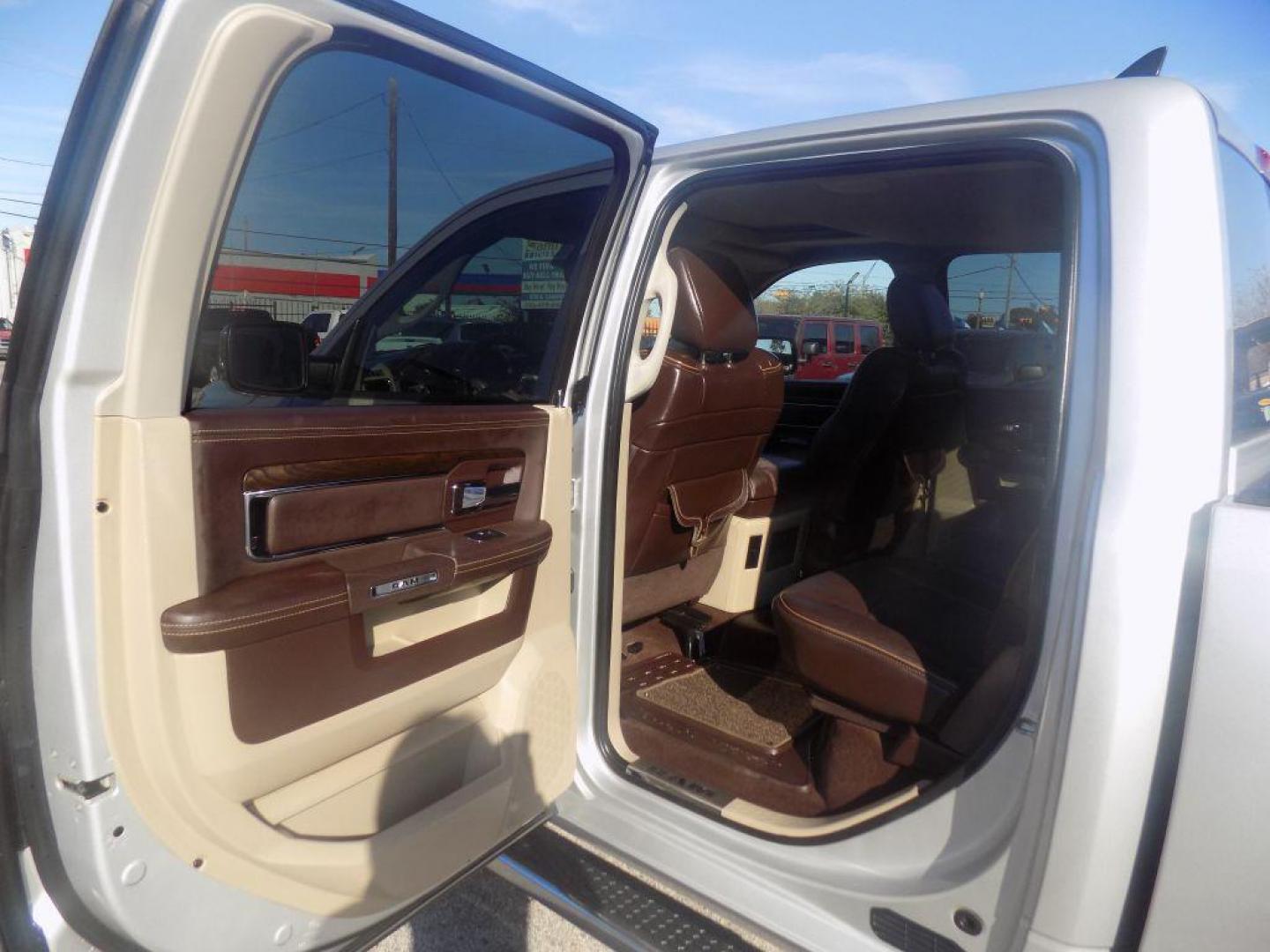 2015 SILVER RAM 1500 LONGHORN (1C6RR6WT8FS) with an 5.7L engine, Automatic transmission, located at 830 E. Canino Rd., Houston, TX, 77037, (281) 405-0440, 38.358219, -81.729942 - Photo#12