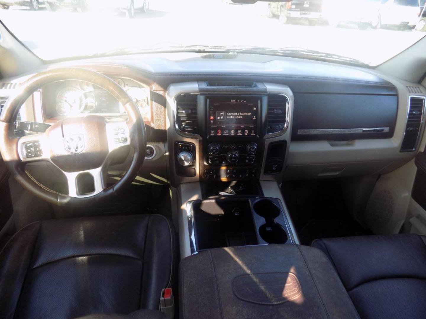 2015 SILVER RAM 1500 LONGHORN (1C6RR6WT8FS) with an 5.7L engine, Automatic transmission, located at 830 E. Canino Rd., Houston, TX, 77037, (281) 405-0440, 38.358219, -81.729942 - Photo#14