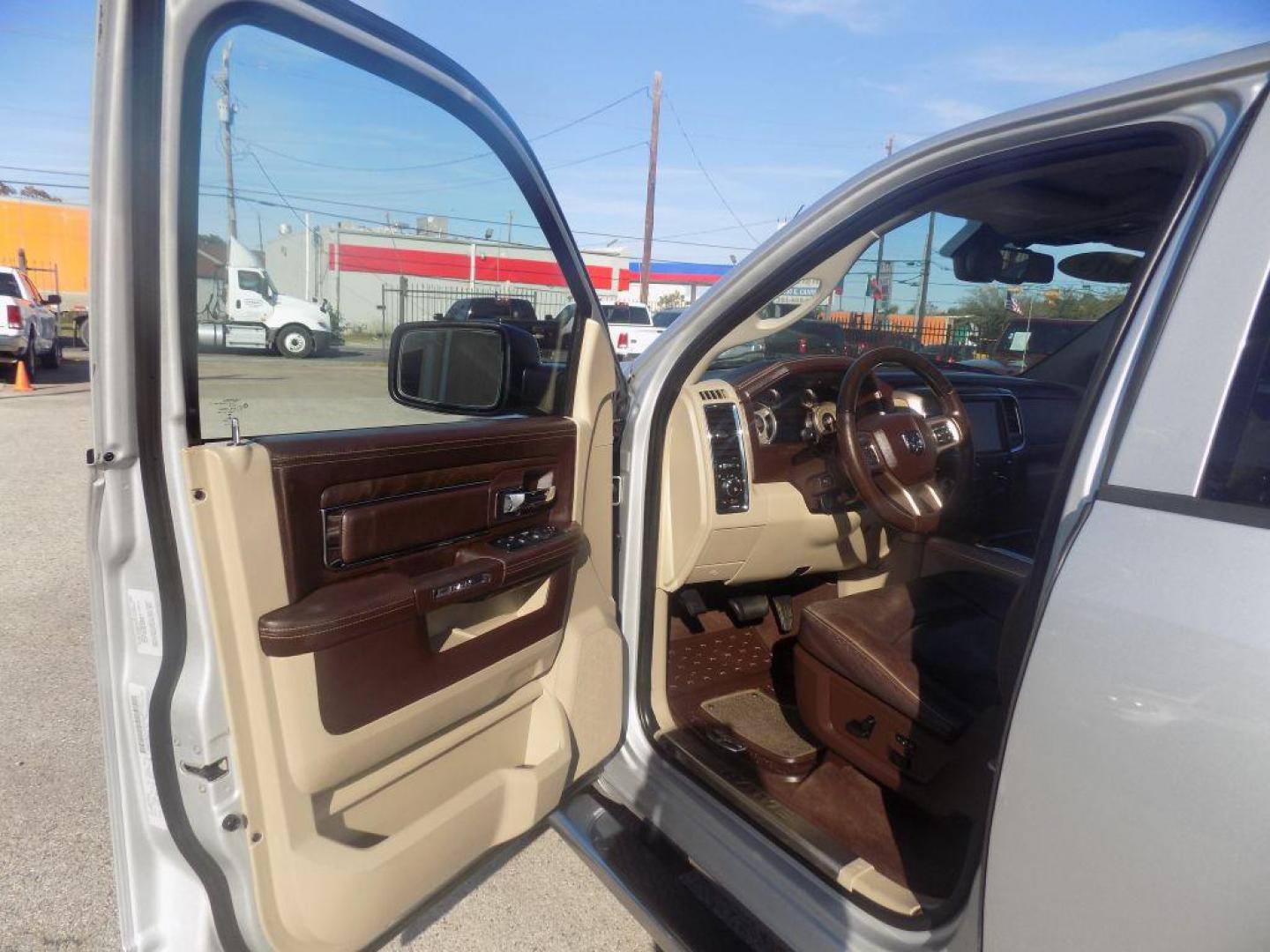 2015 SILVER RAM 1500 LONGHORN (1C6RR6WT8FS) with an 5.7L engine, Automatic transmission, located at 830 E. Canino Rd., Houston, TX, 77037, (281) 405-0440, 38.358219, -81.729942 - Photo#15