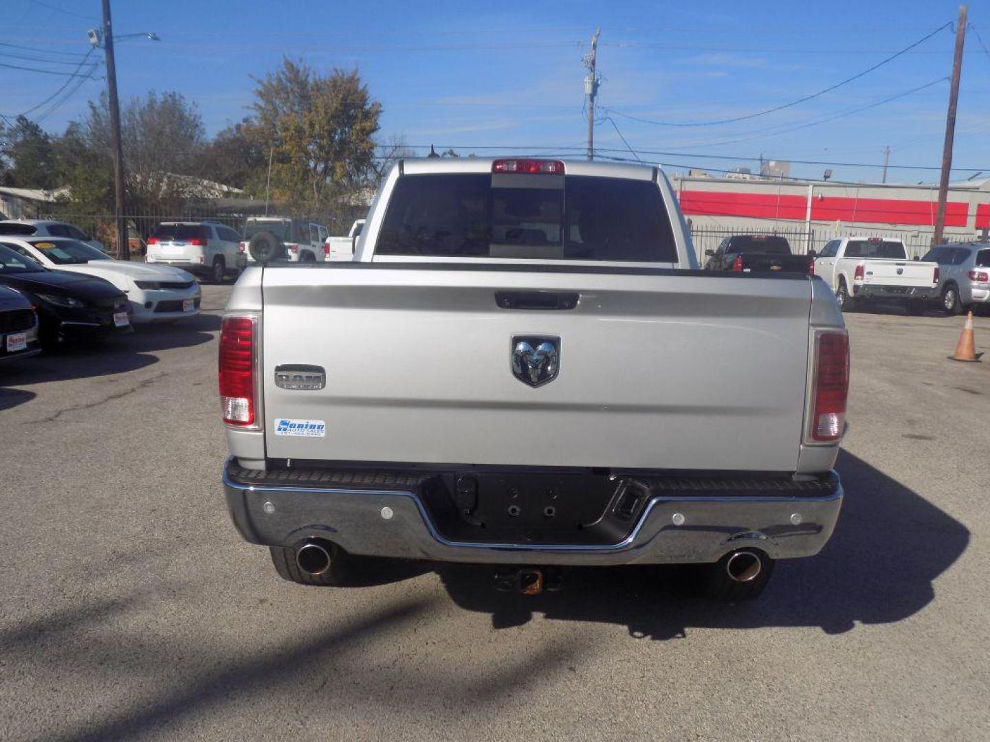 2015 SILVER RAM 1500 LONGHORN (1C6RR6WT8FS) with an 5.7L engine, Automatic transmission, located at 830 E. Canino Rd., Houston, TX, 77037, (281) 405-0440, 38.358219, -81.729942 - Photo#2