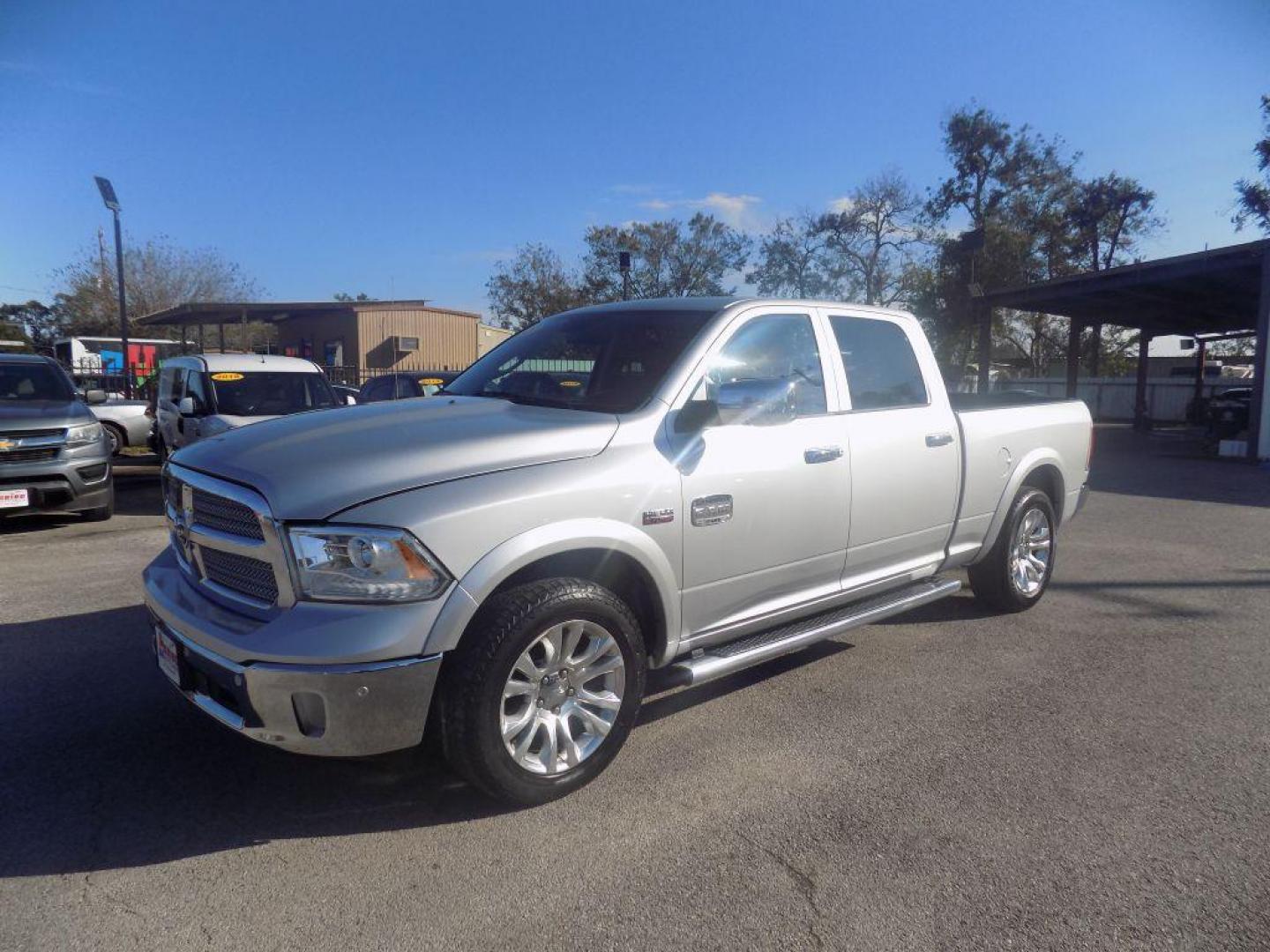2015 SILVER RAM 1500 LONGHORN (1C6RR6WT8FS) with an 5.7L engine, Automatic transmission, located at 830 E. Canino Rd., Houston, TX, 77037, (281) 405-0440, 38.358219, -81.729942 - Photo#5