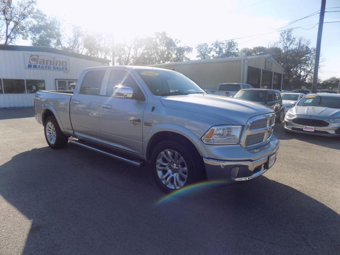 2015 SILVER RAM 1500 LONGHORN (1C6RR6WT8FS) with an 5.7L engine, Automatic transmission, located at 830 E. Canino Rd., Houston, TX, 77037, (281) 405-0440, 38.358219, -81.729942 - Photo#6
