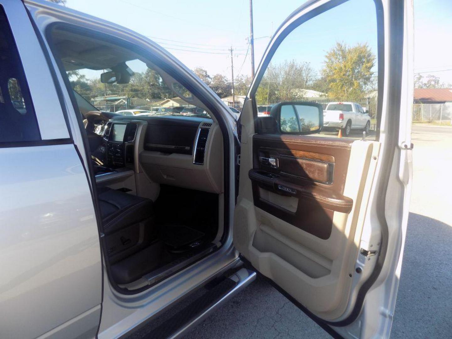 2015 SILVER RAM 1500 LONGHORN (1C6RR6WT8FS) with an 5.7L engine, Automatic transmission, located at 830 E. Canino Rd., Houston, TX, 77037, (281) 405-0440, 38.358219, -81.729942 - Photo#8