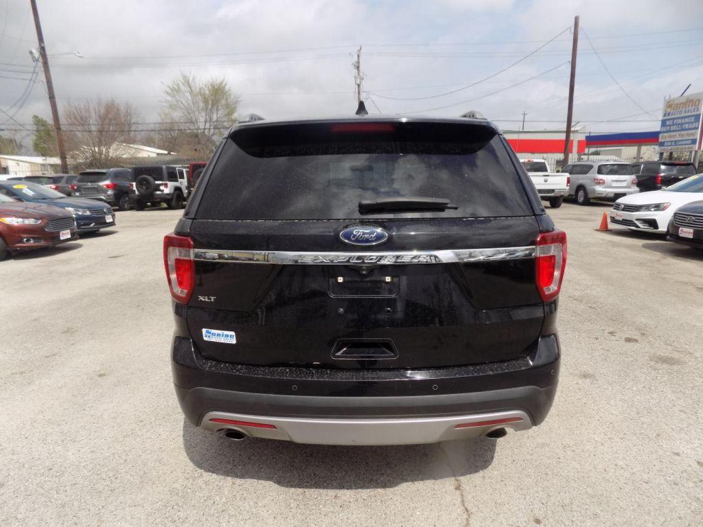 2017 BLACK FORD EXPLORER XLT (1FM5K7D81HG) with an 3.5L engine, Automatic transmission, located at 830 E. Canino Rd., Houston, TX, 77037, (281) 405-0440, 38.358219, -81.729942 - Photo#2