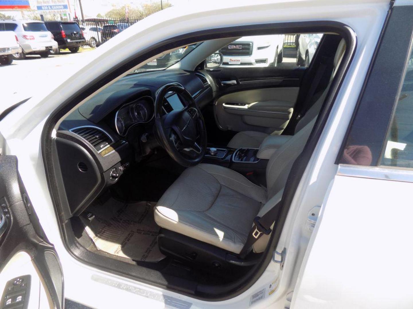 2016 WHITE CHRYSLER 300C (2C3CCAEG8GH) with an 3.6L engine, Automatic transmission, located at 830 E. Canino Rd., Houston, TX, 77037, (281) 405-0440, 38.358219, -81.729942 - Photo#16