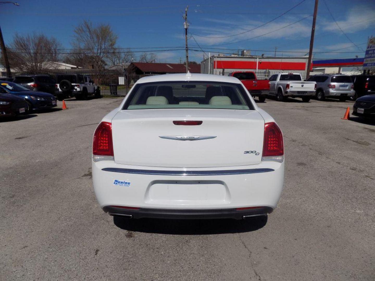 2016 WHITE CHRYSLER 300C (2C3CCAEG8GH) with an 3.6L engine, Automatic transmission, located at 830 E. Canino Rd., Houston, TX, 77037, (281) 405-0440, 38.358219, -81.729942 - Photo#2