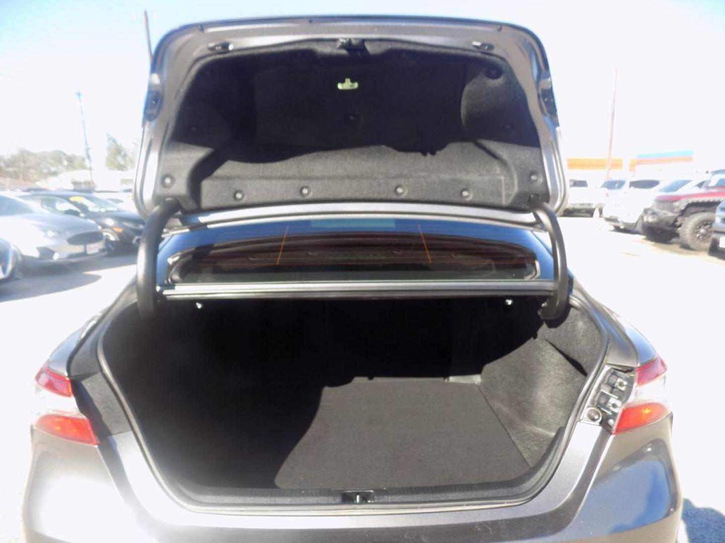 2019 GRAY TOYOTA CAMRY L (4T1B11HKXKU) with an 2.5L engine, Automatic transmission, located at 830 E. Canino Rd., Houston, TX, 77037, (281) 405-0440, 38.358219, -81.729942 - Photo#11