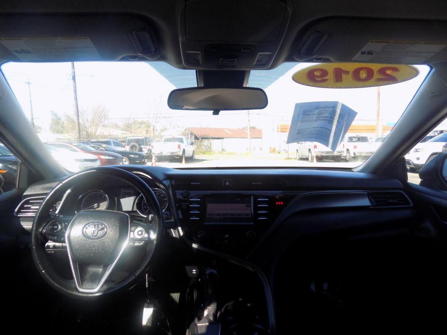 2019 GRAY TOYOTA CAMRY L (4T1B11HKXKU) with an 2.5L engine, Automatic transmission, located at 830 E. Canino Rd., Houston, TX, 77037, (281) 405-0440, 38.358219, -81.729942 - Photo#22