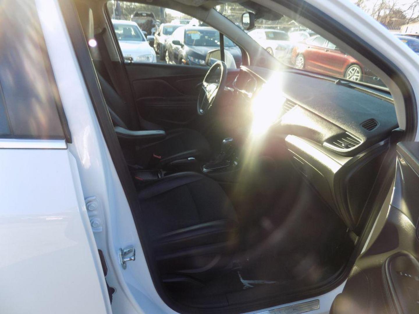 2018 WHITE BUICK ENCORE PREFERRED (KL4CJASB5JB) with an 1.4L engine, Automatic transmission, located at 830 E. Canino Rd., Houston, TX, 77037, (281) 405-0440, 38.358219, -81.729942 - Photo#9