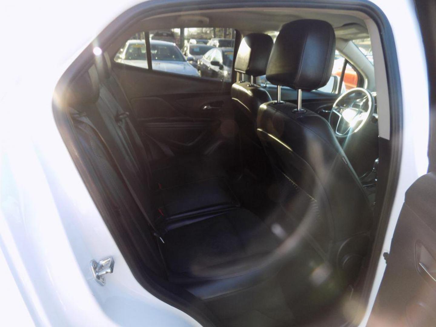 2018 WHITE BUICK ENCORE PREFERRED (KL4CJASB5JB) with an 1.4L engine, Automatic transmission, located at 830 E. Canino Rd., Houston, TX, 77037, (281) 405-0440, 38.358219, -81.729942 - Photo#11