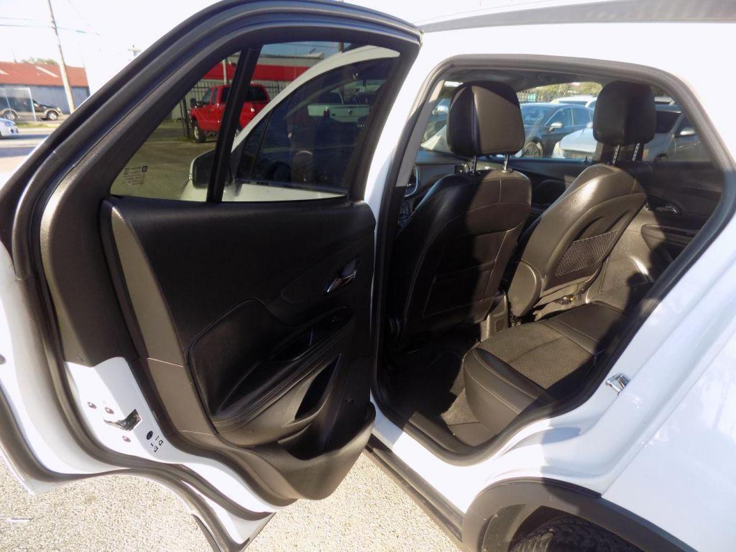 2018 WHITE BUICK ENCORE PREFERRED (KL4CJASB5JB) with an 1.4L engine, Automatic transmission, located at 830 E. Canino Rd., Houston, TX, 77037, (281) 405-0440, 38.358219, -81.729942 - Photo#12