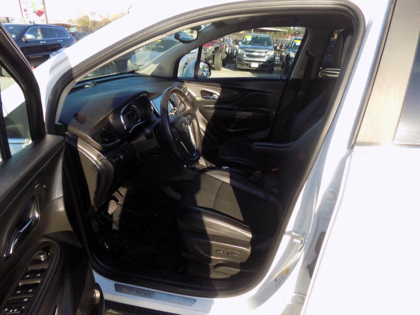 2018 WHITE BUICK ENCORE PREFERRED (KL4CJASB5JB) with an 1.4L engine, Automatic transmission, located at 830 E. Canino Rd., Houston, TX, 77037, (281) 405-0440, 38.358219, -81.729942 - Photo#16