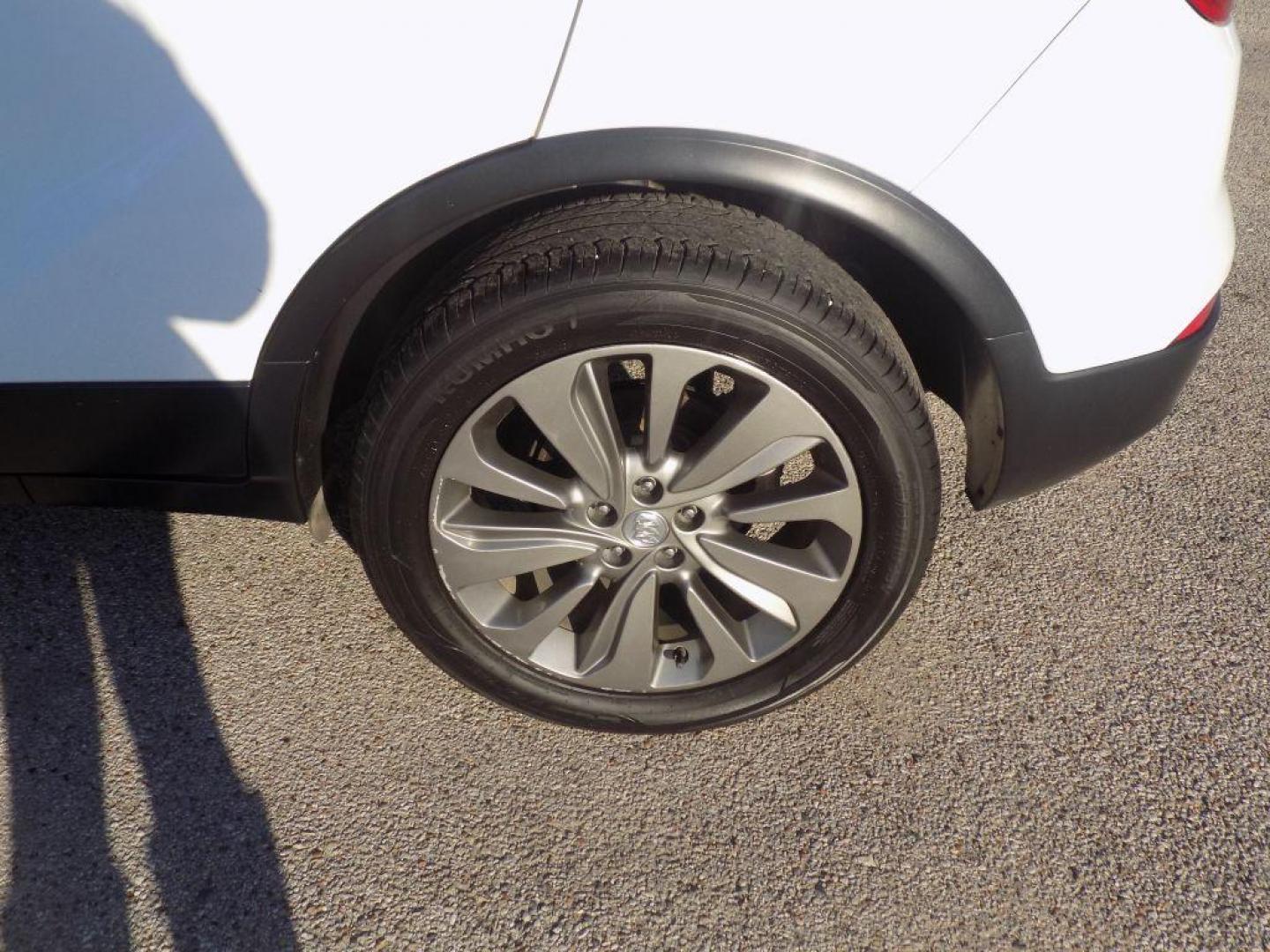2018 WHITE BUICK ENCORE PREFERRED (KL4CJASB5JB) with an 1.4L engine, Automatic transmission, located at 830 E. Canino Rd., Houston, TX, 77037, (281) 405-0440, 38.358219, -81.729942 - Photo#17