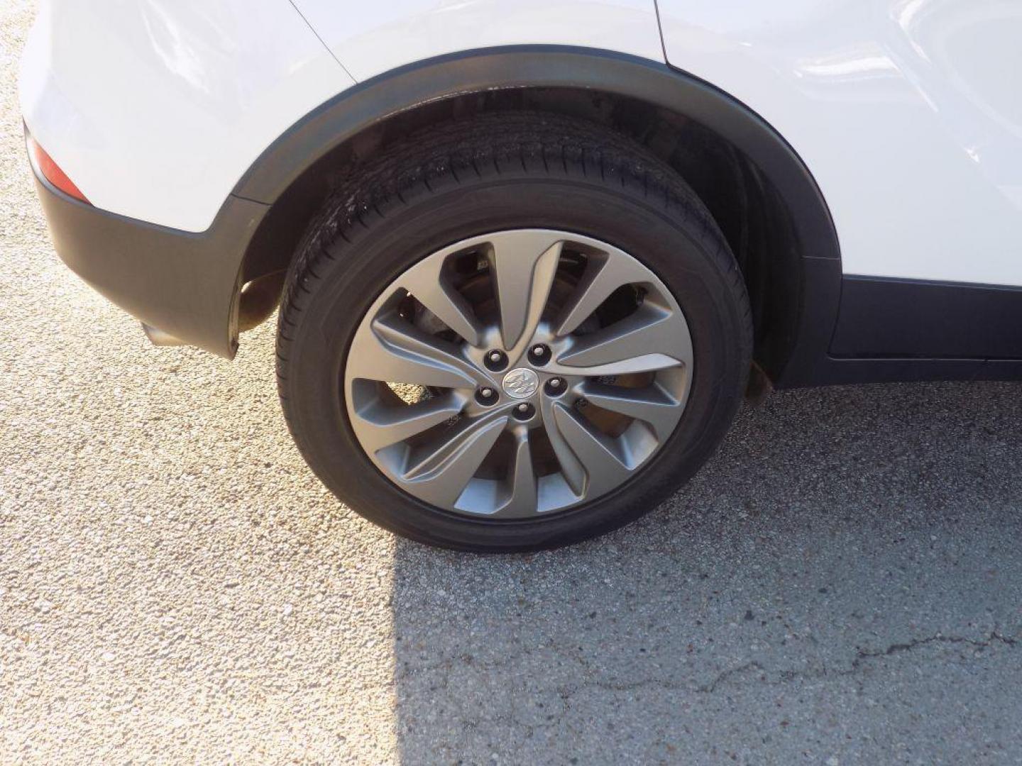 2018 WHITE BUICK ENCORE PREFERRED (KL4CJASB5JB) with an 1.4L engine, Automatic transmission, located at 830 E. Canino Rd., Houston, TX, 77037, (281) 405-0440, 38.358219, -81.729942 - Photo#20