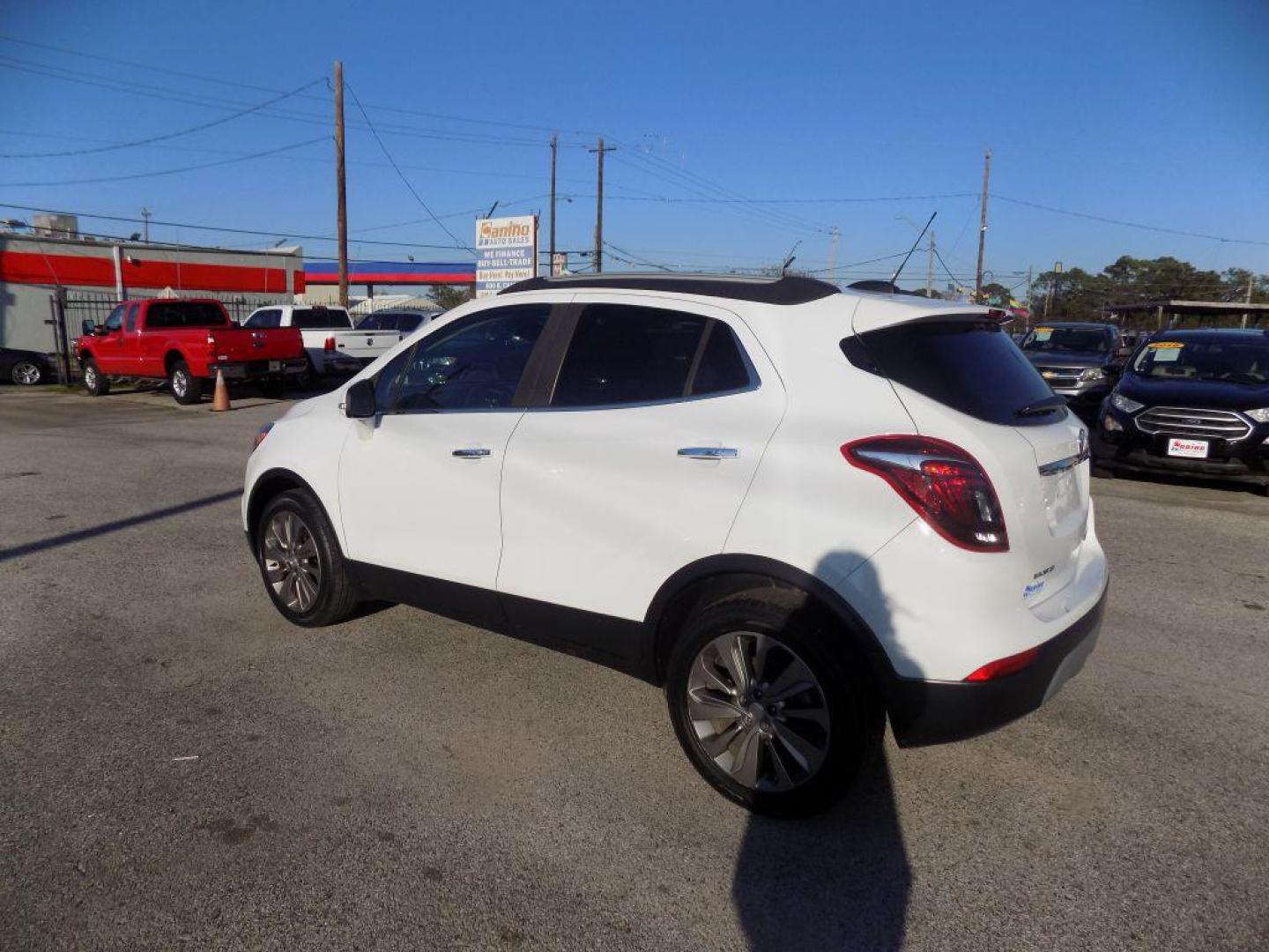 2018 WHITE BUICK ENCORE PREFERRED (KL4CJASB5JB) with an 1.4L engine, Automatic transmission, located at 830 E. Canino Rd., Houston, TX, 77037, (281) 405-0440, 38.358219, -81.729942 - Photo#4
