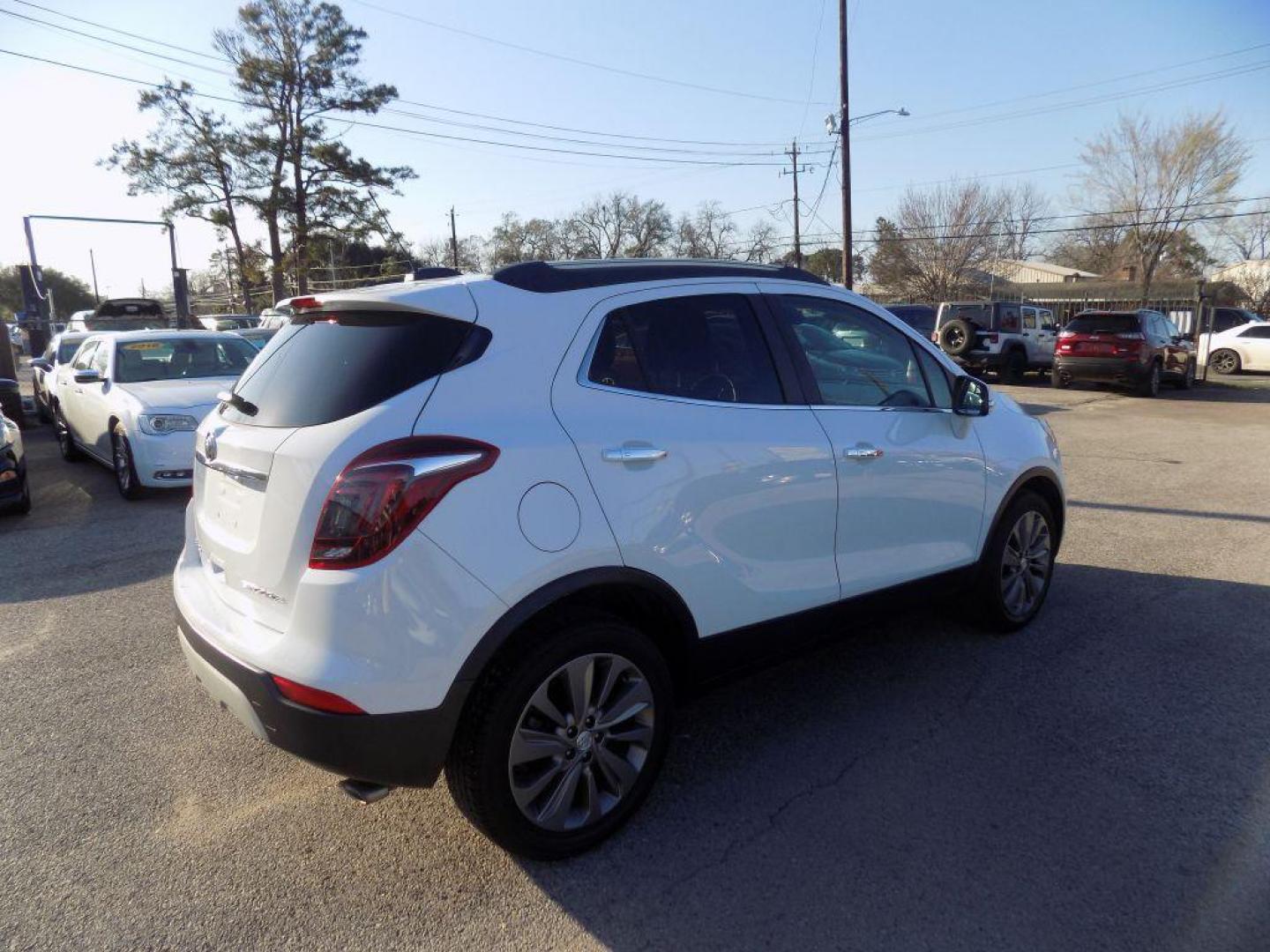 2018 WHITE BUICK ENCORE PREFERRED (KL4CJASB5JB) with an 1.4L engine, Automatic transmission, located at 830 E. Canino Rd., Houston, TX, 77037, (281) 405-0440, 38.358219, -81.729942 - Photo#7
