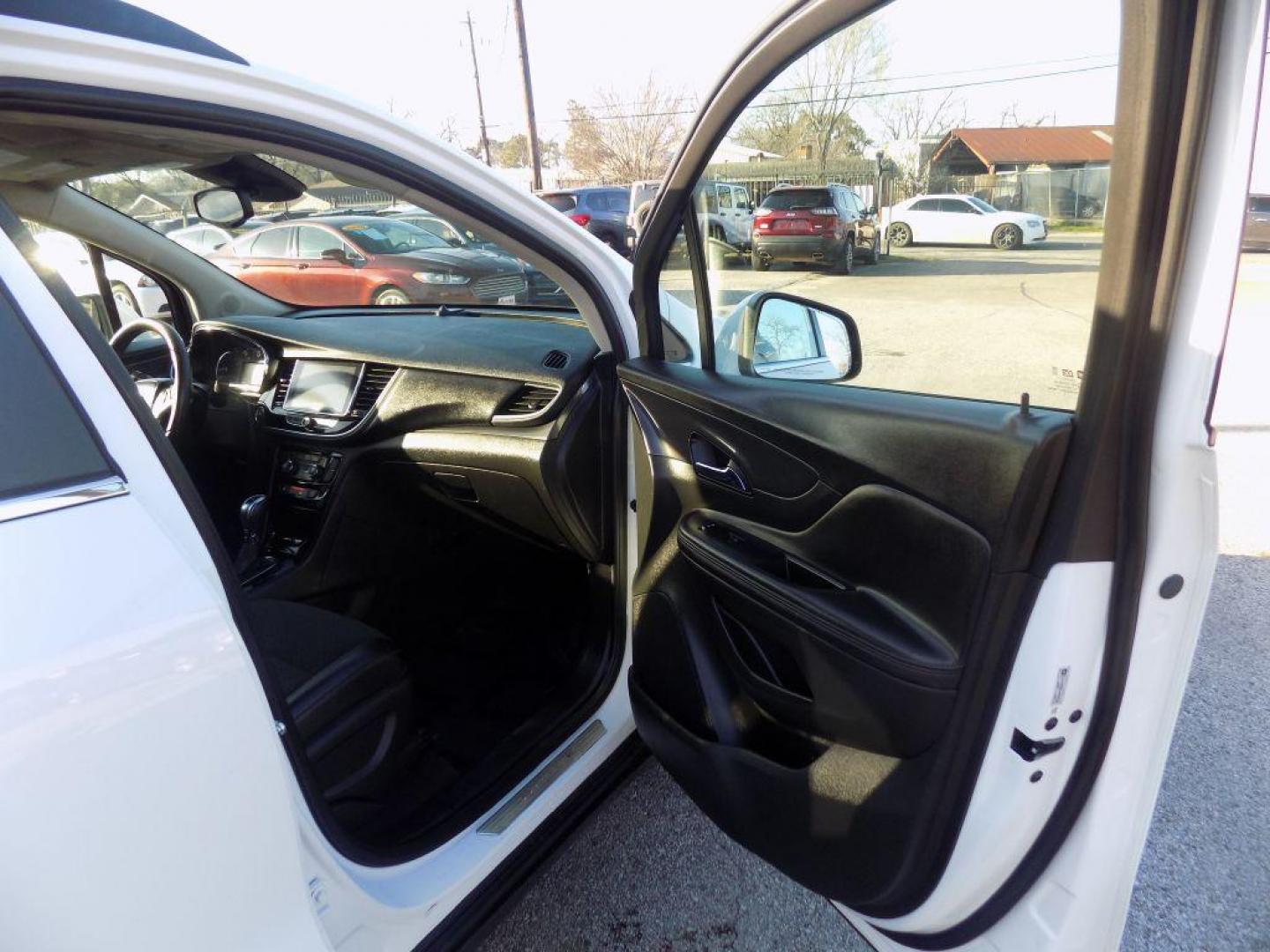 2018 WHITE BUICK ENCORE PREFERRED (KL4CJASB5JB) with an 1.4L engine, Automatic transmission, located at 830 E. Canino Rd., Houston, TX, 77037, (281) 405-0440, 38.358219, -81.729942 - Photo#8