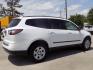 2017 WHITE CHEVROLET TRAVERSE LS (1GNKRFKD8HJ) with an 3.6L engine, Automatic transmission, located at 830 E. Canino Rd., Houston, TX, 77037, (281) 405-0440, 38.358219, -81.729942 - Photo#7