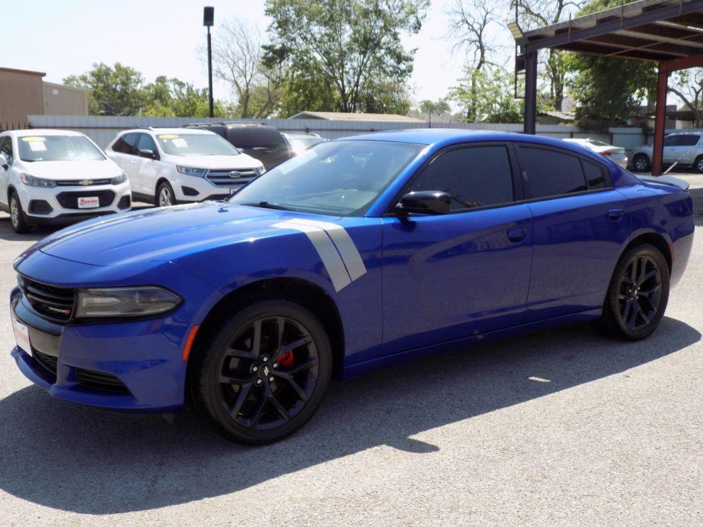 2019 BLUE DODGE CHARGER SXT (2C3CDXBG3KH) with an 3.6L engine, Automatic transmission, located at 830 E. Canino Rd., Houston, TX, 77037, (281) 405-0440, 38.358219, -81.729942 - Photo#1