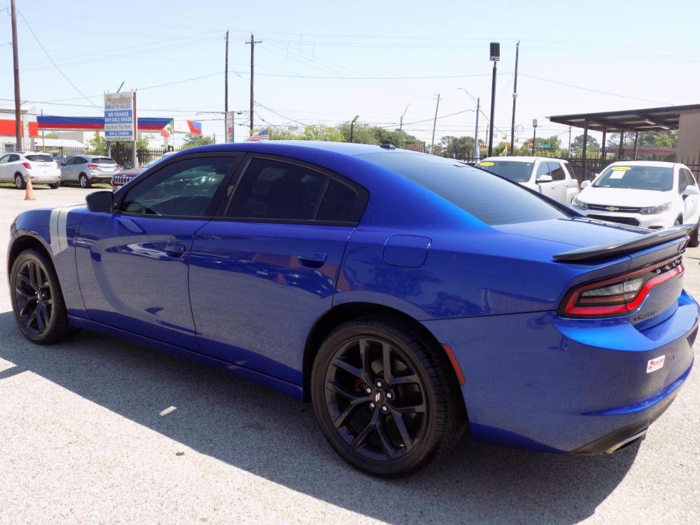 2019 BLUE DODGE CHARGER SXT (2C3CDXBG3KH) with an 3.6L engine, Automatic transmission, located at 830 E. Canino Rd., Houston, TX, 77037, (281) 405-0440, 38.358219, -81.729942 - Photo#3