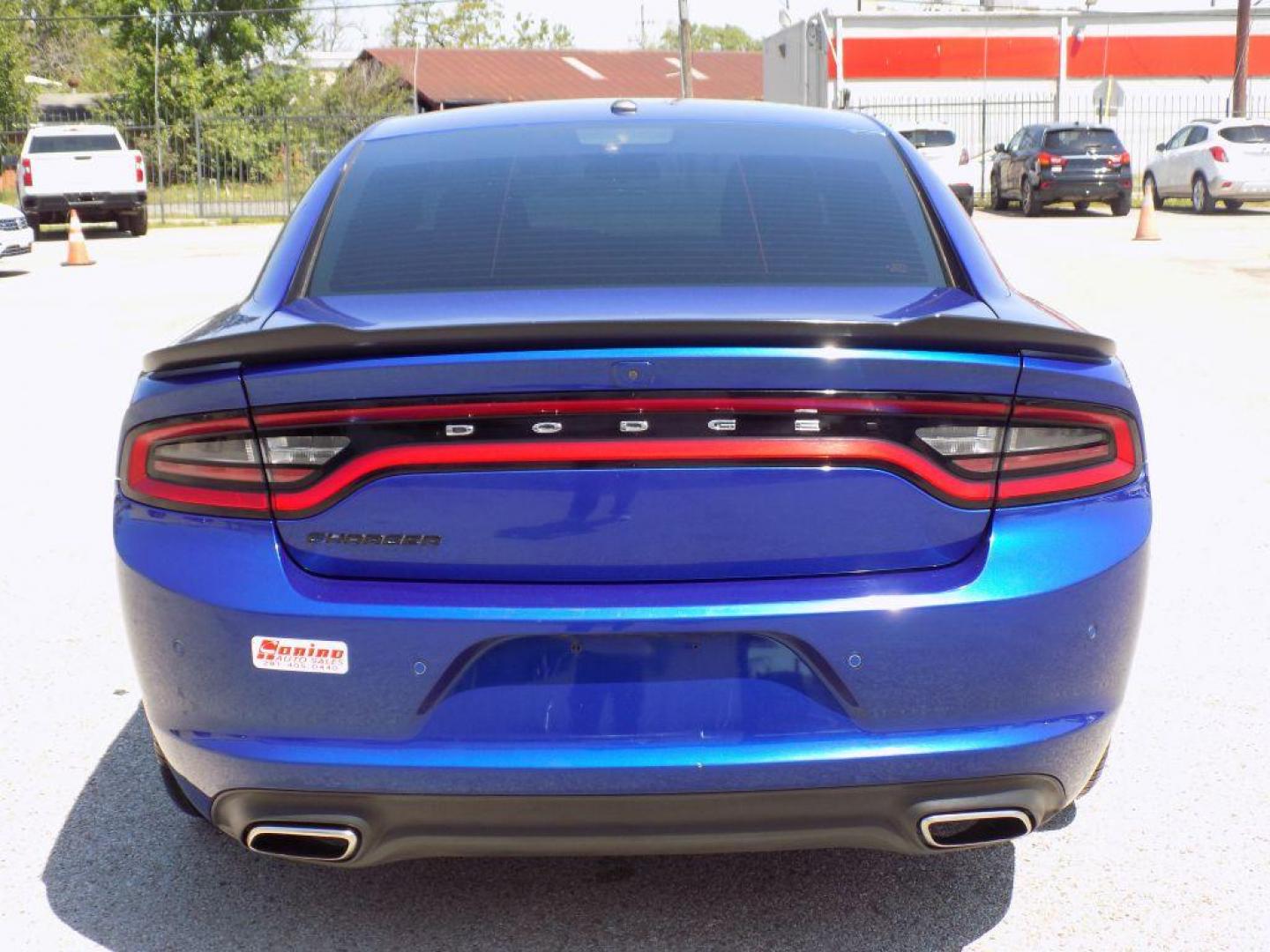 2019 BLUE DODGE CHARGER SXT (2C3CDXBG3KH) with an 3.6L engine, Automatic transmission, located at 830 E. Canino Rd., Houston, TX, 77037, (281) 405-0440, 38.358219, -81.729942 - Photo#4