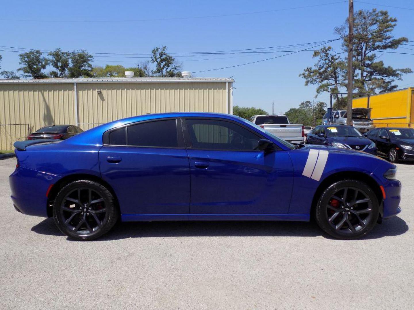 2019 BLUE DODGE CHARGER SXT (2C3CDXBG3KH) with an 3.6L engine, Automatic transmission, located at 830 E. Canino Rd., Houston, TX, 77037, (281) 405-0440, 38.358219, -81.729942 - Photo#6