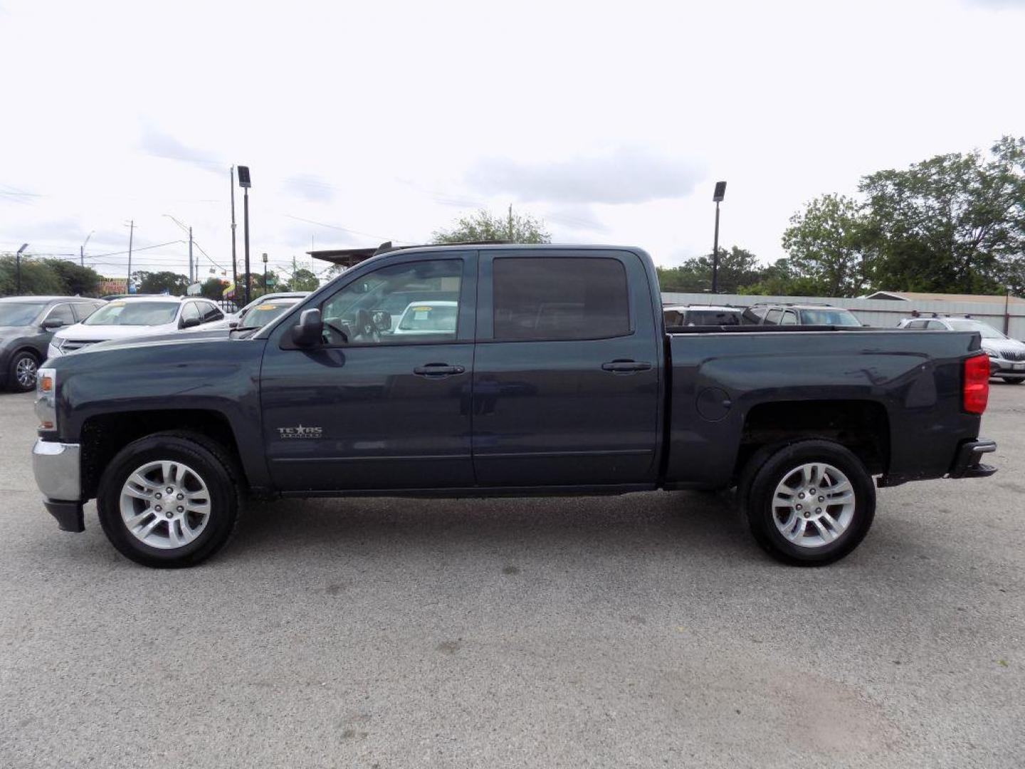 2018 BLUE CHEVROLET SILVERADO 1500 LT (3GCPCREC7JG) with an 5.3L engine, Automatic transmission, located at 830 E. Canino Rd., Houston, TX, 77037, (281) 405-0440, 38.358219, -81.729942 - Photo#2
