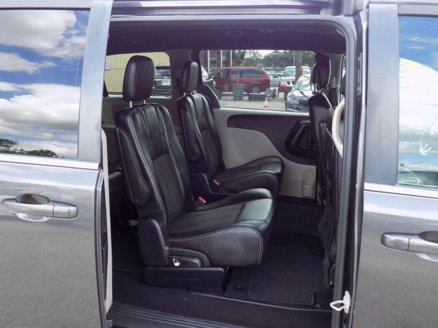 2019 GRAY DODGE GRAND CARAVAN SXT (2C4RDGCG7KR) with an 3.6L engine, Automatic transmission, located at 830 E. Canino Rd., Houston, TX, 77037, (281) 405-0440, 38.358219, -81.729942 - Photo#11