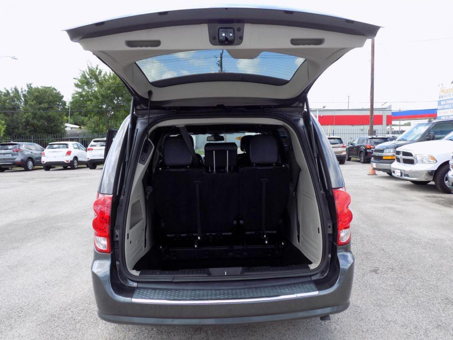 2019 GRAY DODGE GRAND CARAVAN SXT (2C4RDGCG7KR) with an 3.6L engine, Automatic transmission, located at 830 E. Canino Rd., Houston, TX, 77037, (281) 405-0440, 38.358219, -81.729942 - Photo#12