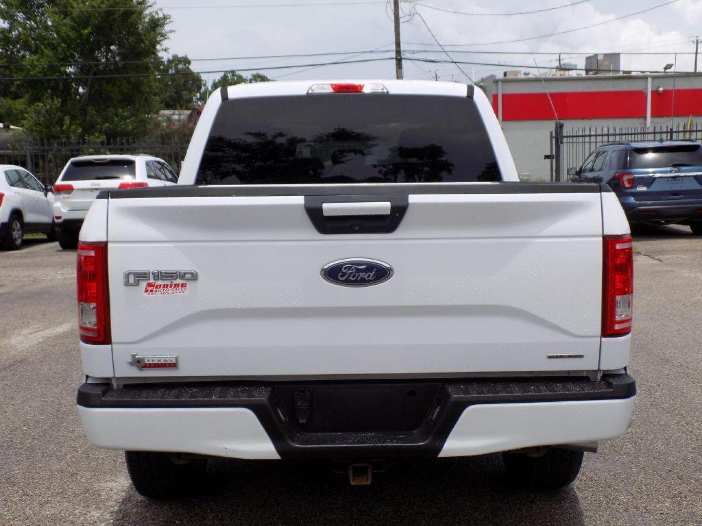 2016 WHITE FORD F150 SUPERCREW (1FTEW1EF5GK) with an 5.0L engine, Automatic transmission, located at 830 E. Canino Rd., Houston, TX, 77037, (281) 405-0440, 38.358219, -81.729942 - Photo#4