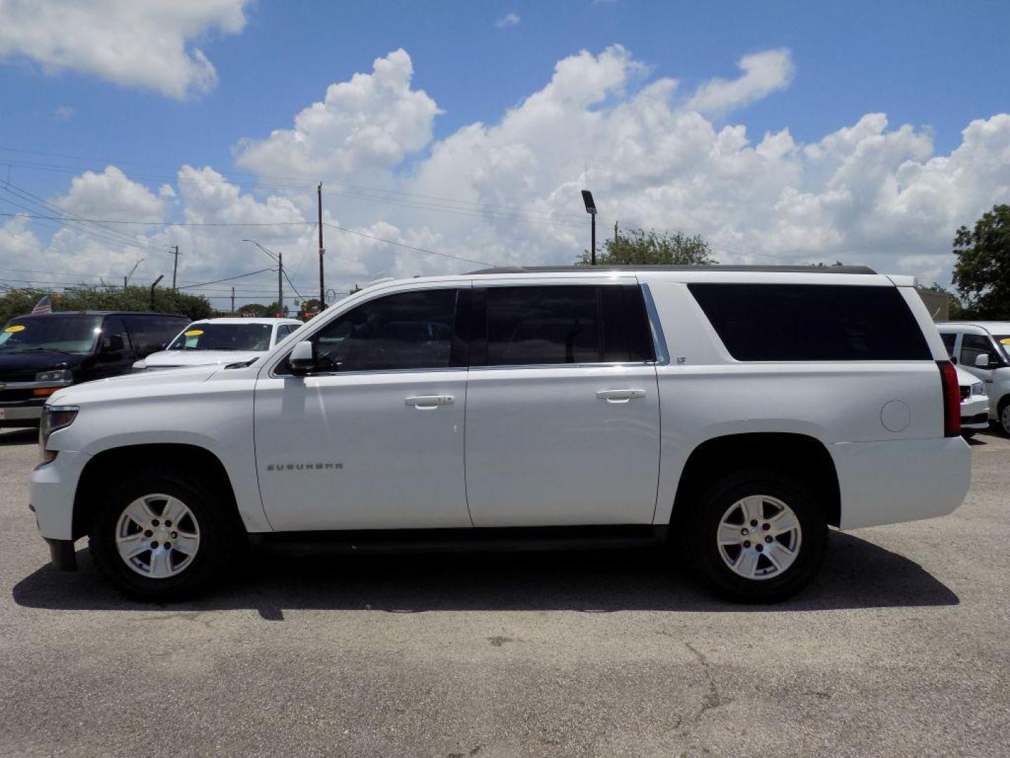 2016 WHITE CHEVROLET SUBURBAN 1500 LT (1GNSCHKC0GR) with an 5.3L engine, Automatic transmission, located at 830 E. Canino Rd., Houston, TX, 77037, (281) 405-0440, 38.358219, -81.729942 - Photo#2