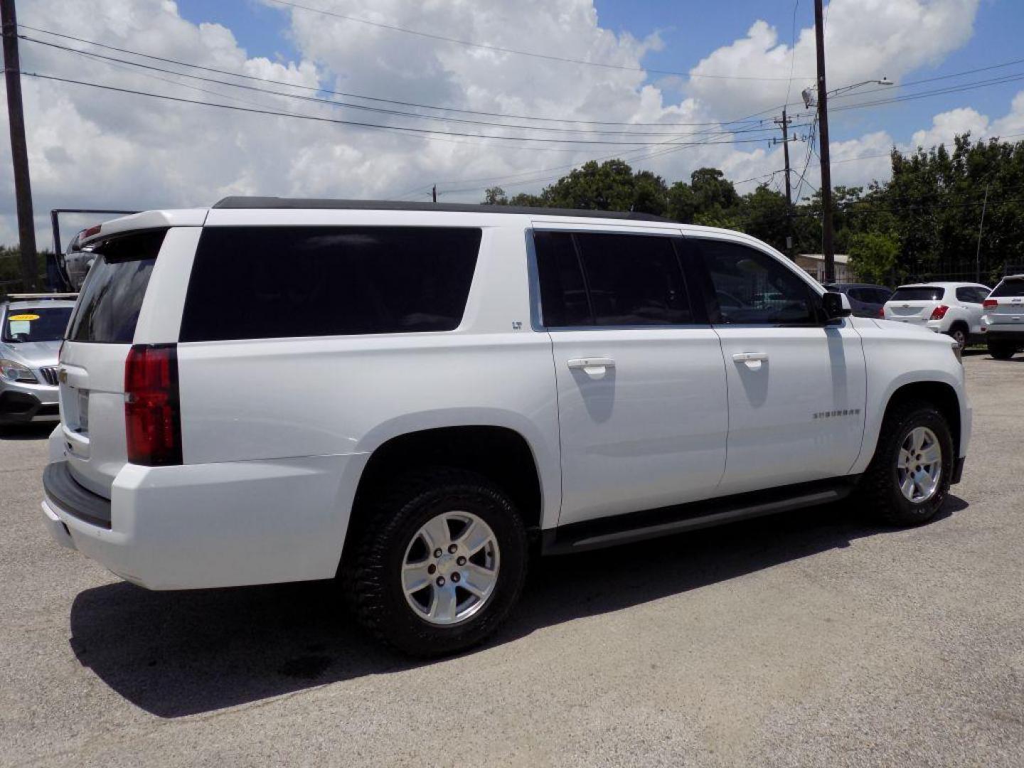2016 WHITE CHEVROLET SUBURBAN 1500 LT (1GNSCHKC0GR) with an 5.3L engine, Automatic transmission, located at 830 E. Canino Rd., Houston, TX, 77037, (281) 405-0440, 38.358219, -81.729942 - Photo#5