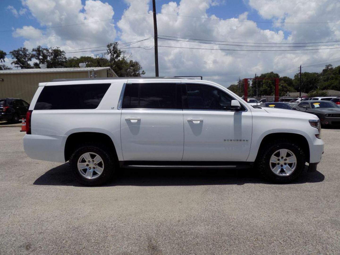 2016 WHITE CHEVROLET SUBURBAN 1500 LT (1GNSCHKC0GR) with an 5.3L engine, Automatic transmission, located at 830 E. Canino Rd., Houston, TX, 77037, (281) 405-0440, 38.358219, -81.729942 - Photo#6