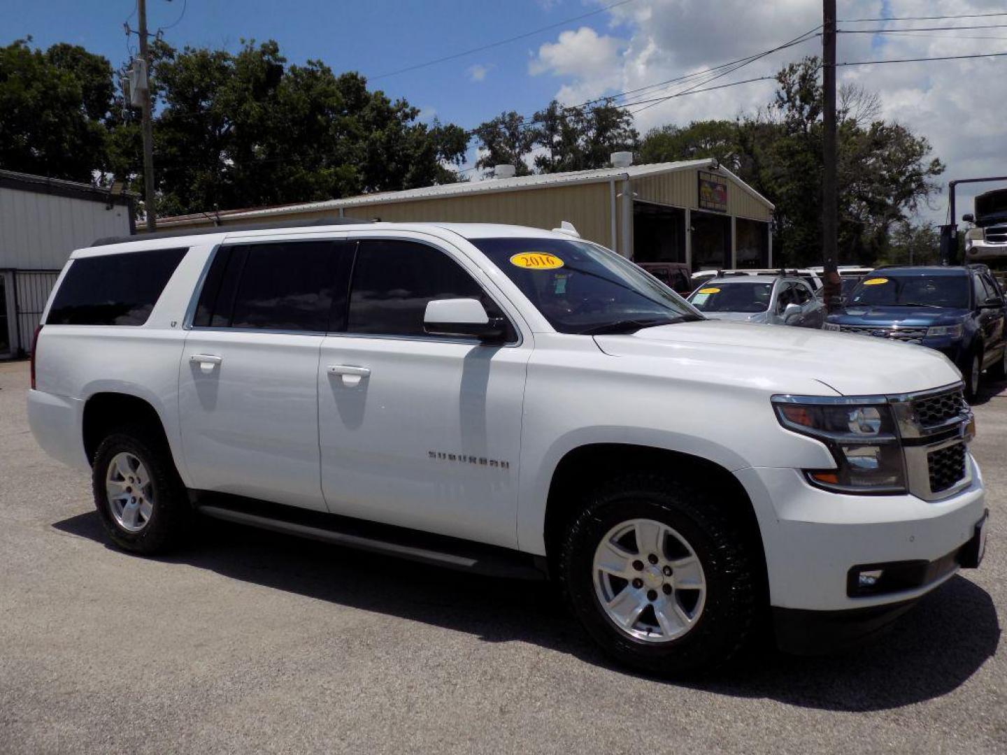 2016 WHITE CHEVROLET SUBURBAN 1500 LT (1GNSCHKC0GR) with an 5.3L engine, Automatic transmission, located at 830 E. Canino Rd., Houston, TX, 77037, (281) 405-0440, 38.358219, -81.729942 - Photo#7