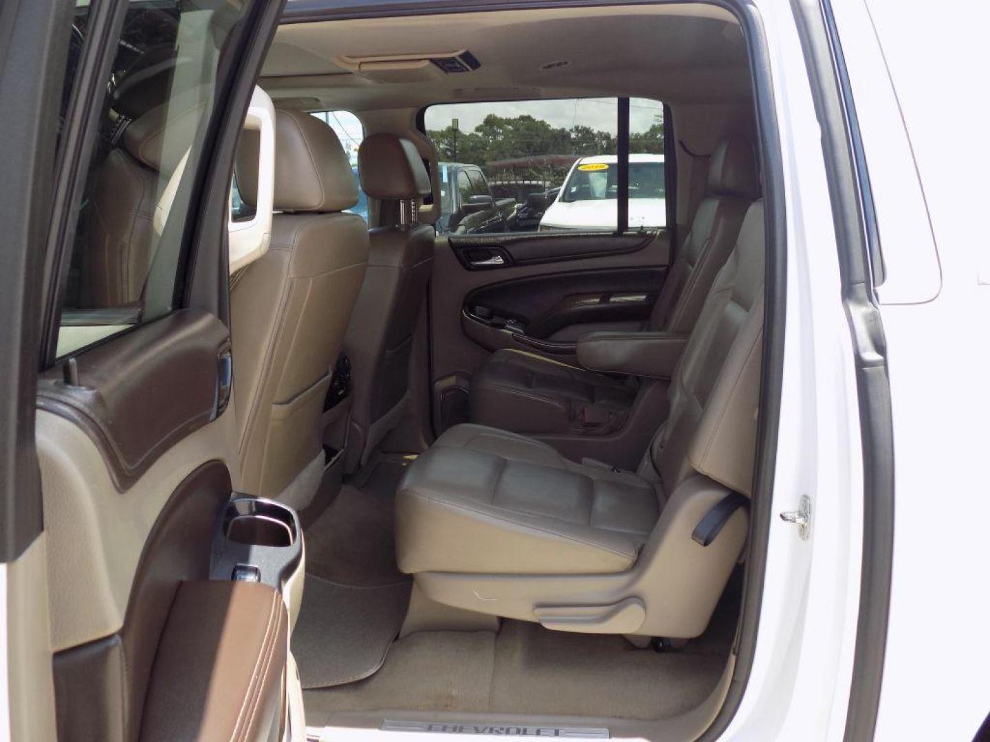 2016 WHITE CHEVROLET SUBURBAN 1500 LT (1GNSCHKC0GR) with an 5.3L engine, Automatic transmission, located at 830 E. Canino Rd., Houston, TX, 77037, (281) 405-0440, 38.358219, -81.729942 - Photo#9