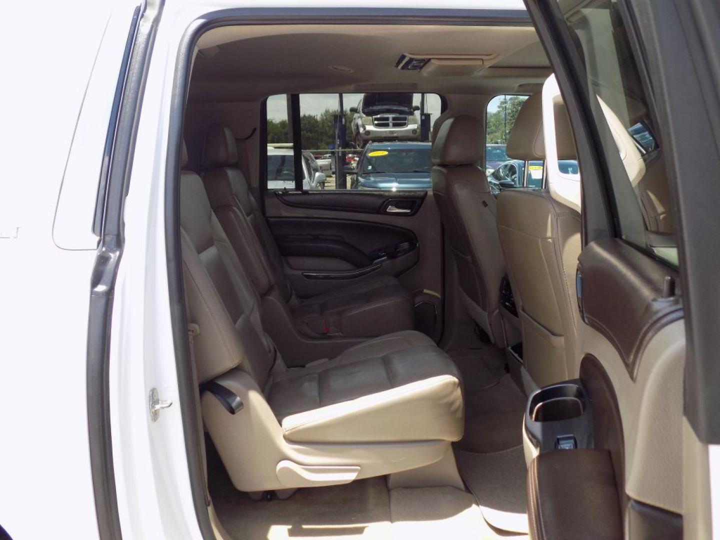 2016 WHITE CHEVROLET SUBURBAN 1500 LT (1GNSCHKC0GR) with an 5.3L engine, Automatic transmission, located at 830 E. Canino Rd., Houston, TX, 77037, (281) 405-0440, 38.358219, -81.729942 - Photo#11