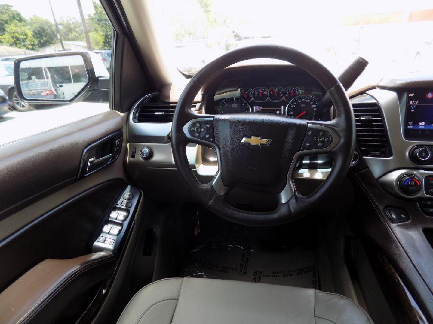 2016 WHITE CHEVROLET SUBURBAN 1500 LT (1GNSCHKC0GR) with an 5.3L engine, Automatic transmission, located at 830 E. Canino Rd., Houston, TX, 77037, (281) 405-0440, 38.358219, -81.729942 - Photo#16
