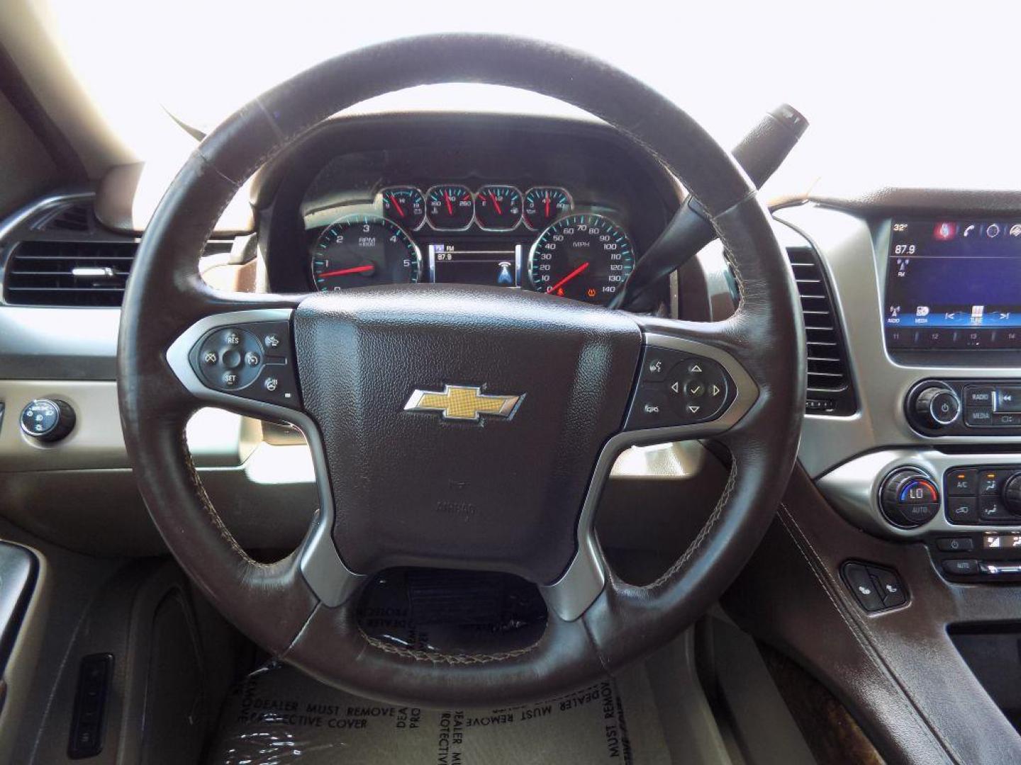 2016 WHITE CHEVROLET SUBURBAN 1500 LT (1GNSCHKC0GR) with an 5.3L engine, Automatic transmission, located at 830 E. Canino Rd., Houston, TX, 77037, (281) 405-0440, 38.358219, -81.729942 - Photo#17