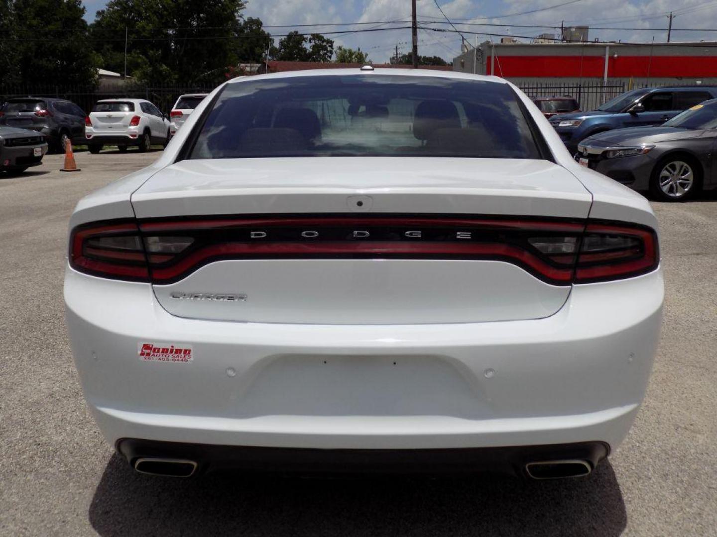2022 WHITE DODGE CHARGER SXT (2C3CDXBG2NH) with an 3.6L engine, Automatic transmission, located at 830 E. Canino Rd., Houston, TX, 77037, (281) 405-0440, 38.358219, -81.729942 - Photo#4