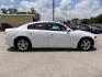 2022 WHITE DODGE CHARGER SXT (2C3CDXBG2NH) with an 3.6L engine, Automatic transmission, located at 830 E. Canino Rd., Houston, TX, 77037, (281) 405-0440, 38.358219, -81.729942 - Photo#6