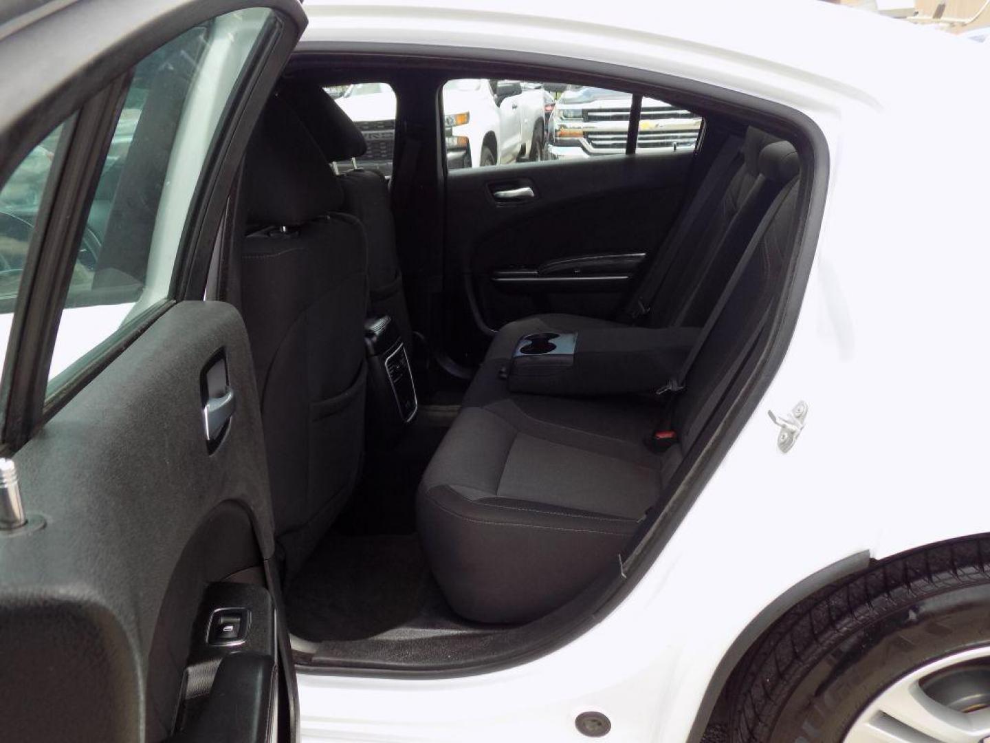 2022 WHITE DODGE CHARGER SXT (2C3CDXBG2NH) with an 3.6L engine, Automatic transmission, located at 830 E. Canino Rd., Houston, TX, 77037, (281) 405-0440, 38.358219, -81.729942 - Photo#9
