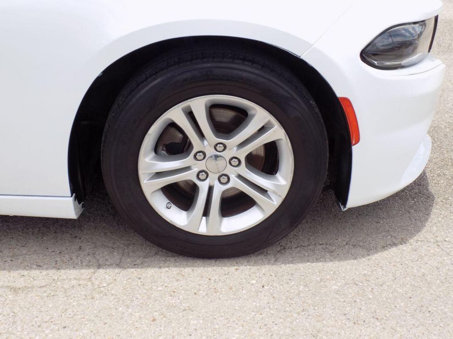 2022 WHITE DODGE CHARGER SXT (2C3CDXBG2NH) with an 3.6L engine, Automatic transmission, located at 830 E. Canino Rd., Houston, TX, 77037, (281) 405-0440, 38.358219, -81.729942 - Photo#16