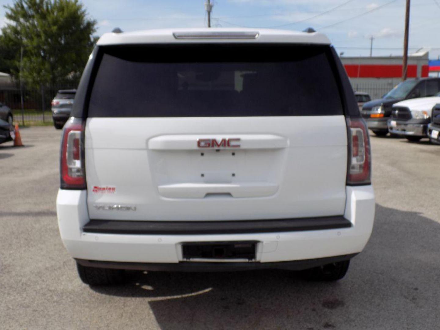 2016 WHITE GMC YUKON SLE (1GKS1AKC3GR) with an 5.3L engine, Automatic transmission, located at 830 E. Canino Rd., Houston, TX, 77037, (281) 405-0440, 38.358219, -81.729942 - Photo#4