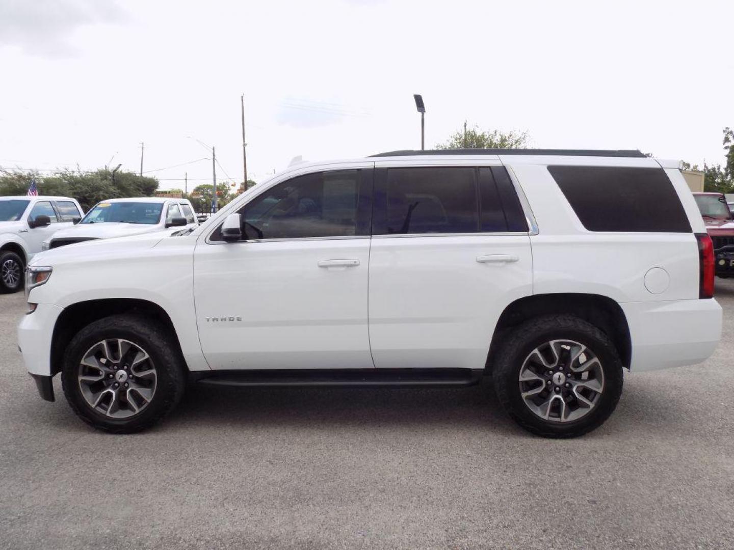 2019 WHITE CHEVROLET TAHOE 1500 LS (1GNSCAKC9KR) with an 5.3L engine, Automatic transmission, located at 830 E. Canino Rd., Houston, TX, 77037, (281) 405-0440, 38.358219, -81.729942 - Photo#2