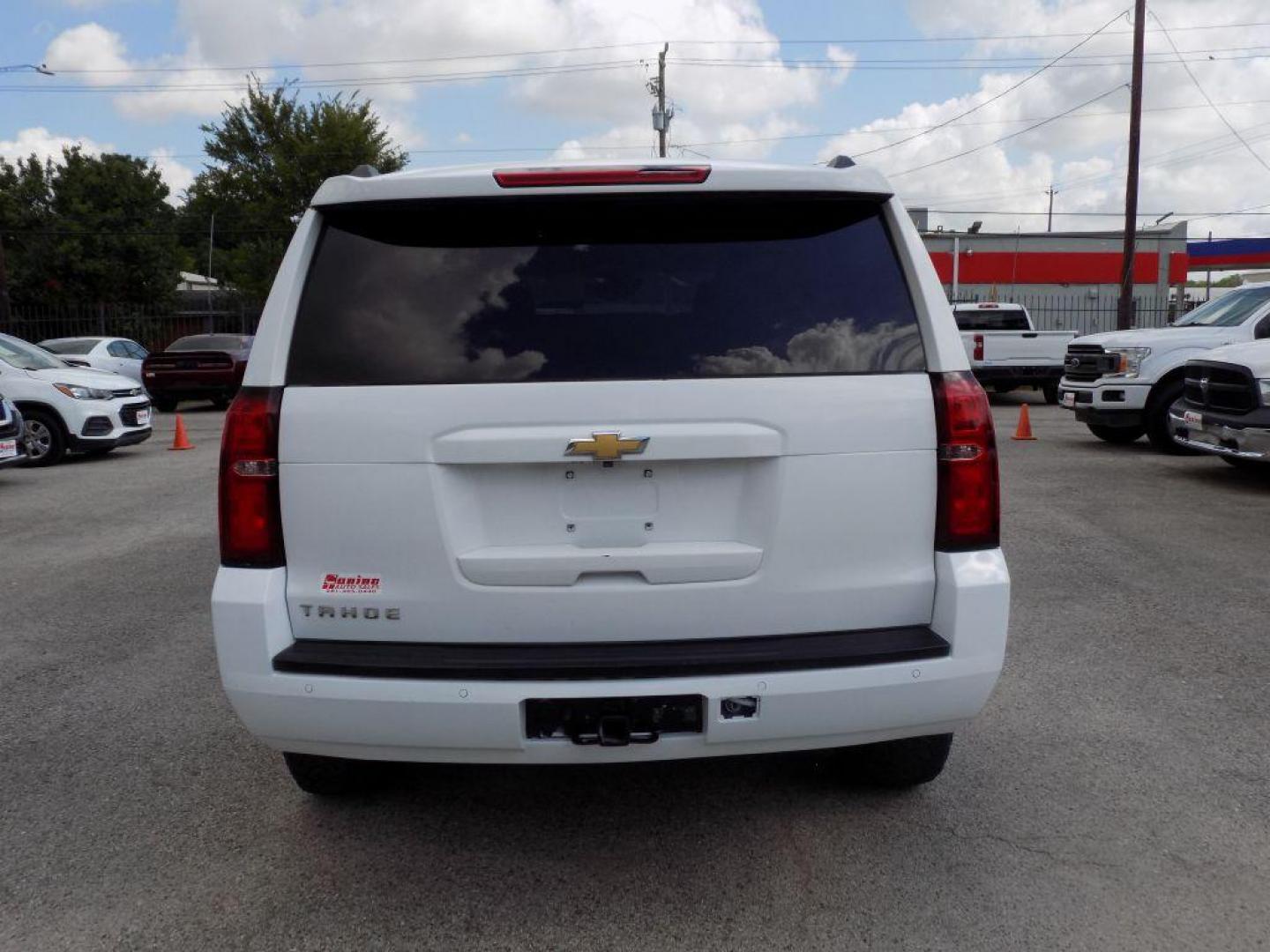2019 WHITE CHEVROLET TAHOE 1500 LS (1GNSCAKC9KR) with an 5.3L engine, Automatic transmission, located at 830 E. Canino Rd., Houston, TX, 77037, (281) 405-0440, 38.358219, -81.729942 - Photo#4