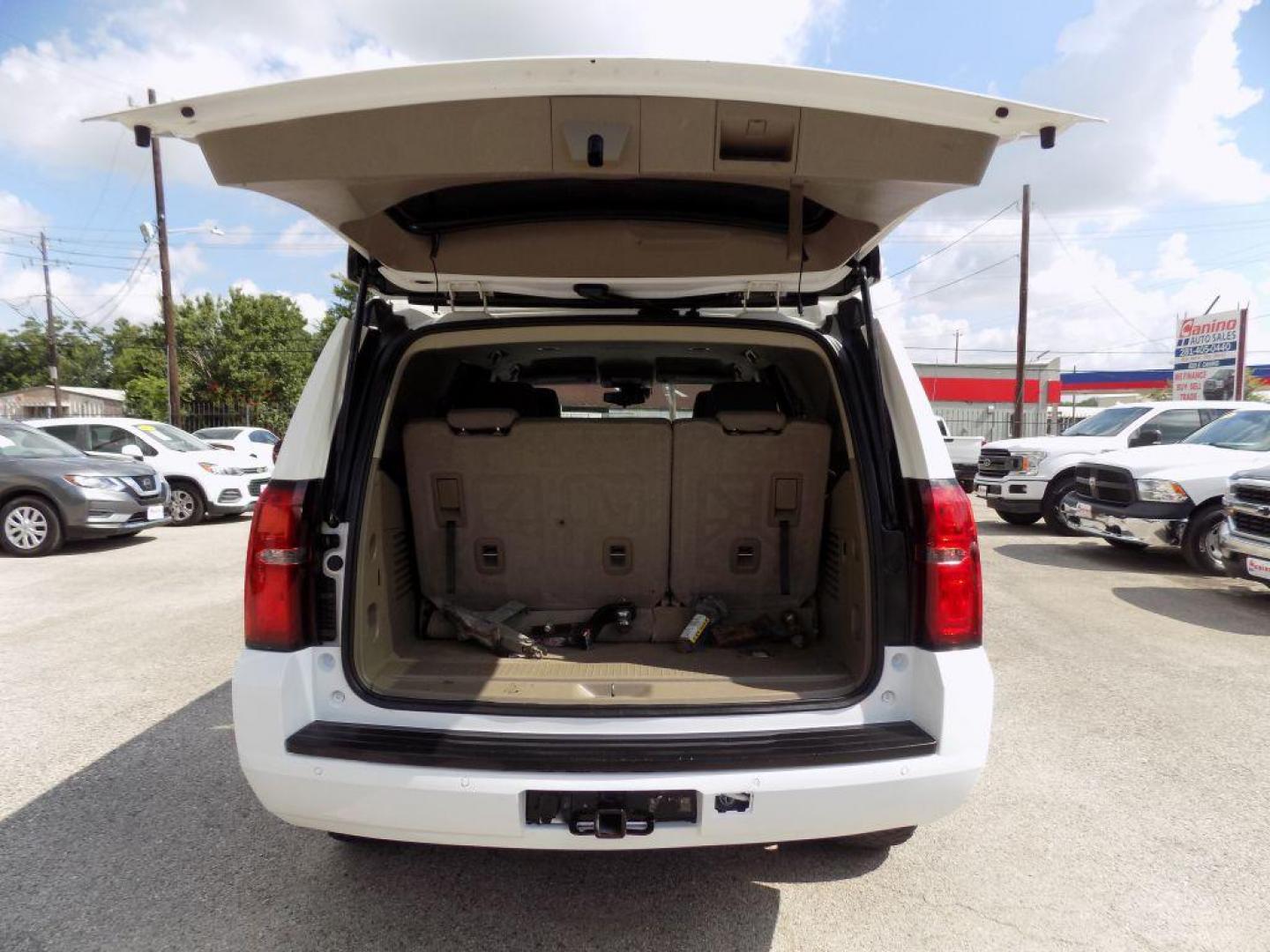 2019 WHITE CHEVROLET TAHOE 1500 LS (1GNSCAKC9KR) with an 5.3L engine, Automatic transmission, located at 830 E. Canino Rd., Houston, TX, 77037, (281) 405-0440, 38.358219, -81.729942 - Photo#12